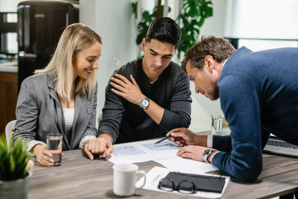 Couple discussing floor plans.
